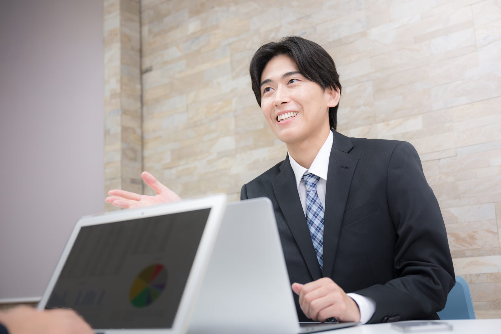 経営者と向き合う面談の様子